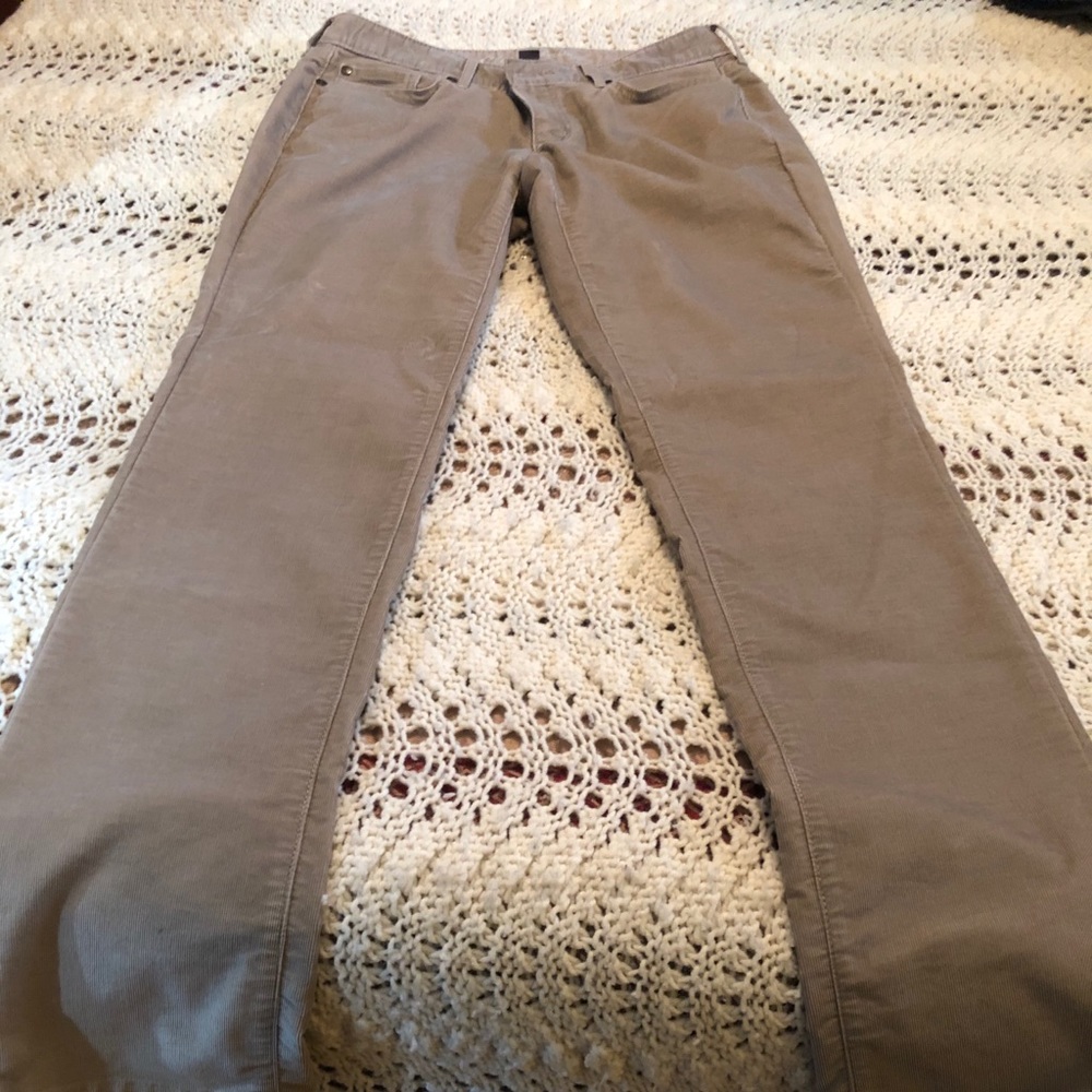 straight-legged, slightly curvy corduroy pants.